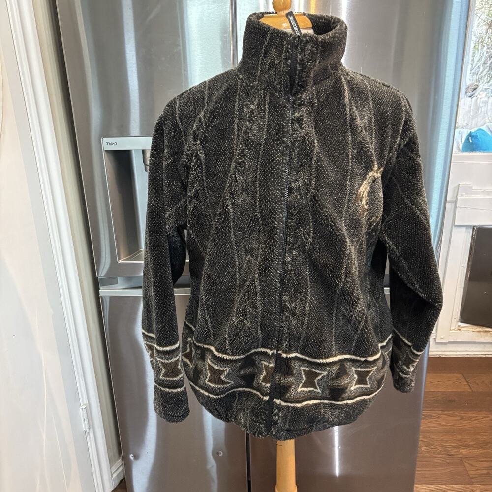 vintage 1990s fleece jacket featuring a Native American-inspired dreamcatcher